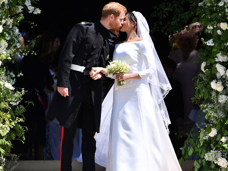 Prince Harry and Meghan Markle kissing on their wedding day.