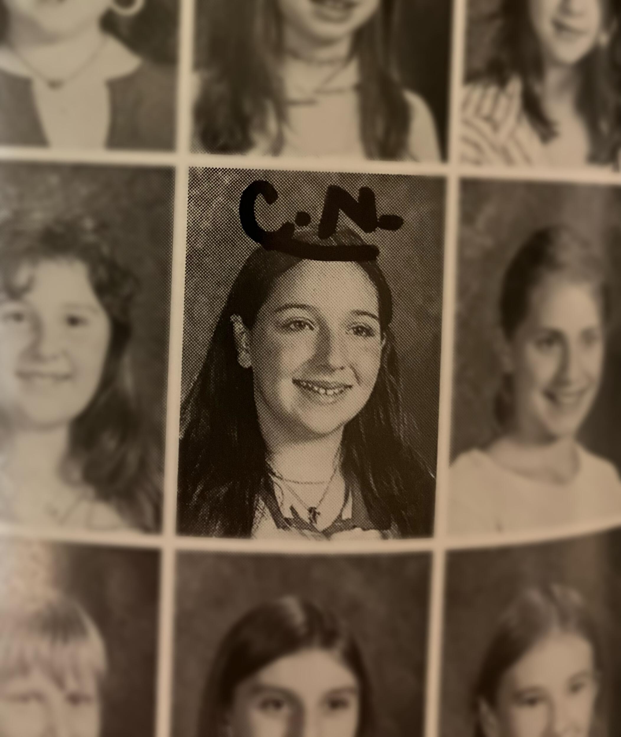 Middle school Christy (who initialed her own year book photo in case she couldn't remember which kid she was)