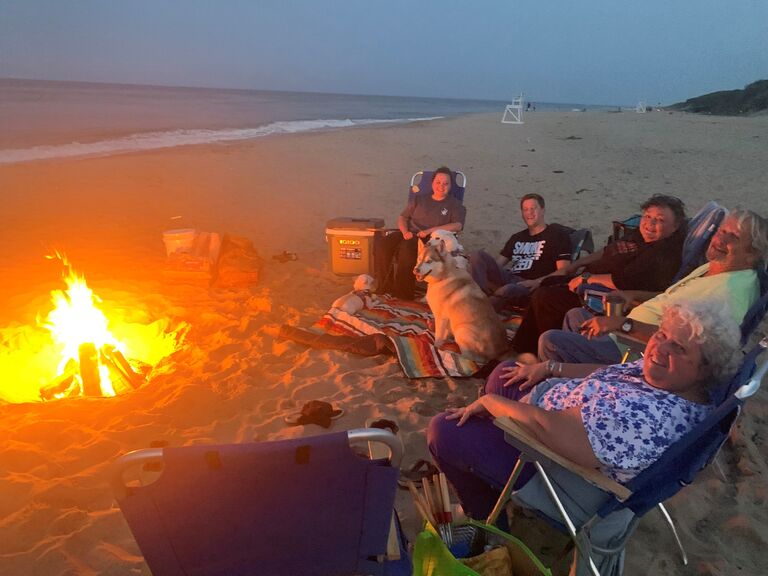 Sarah & Steve's parents meet for the first time, and they have a bonfire on Coast Guard Beach in Cape Cod. 