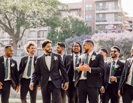 Groom and groomsmen wearing suits