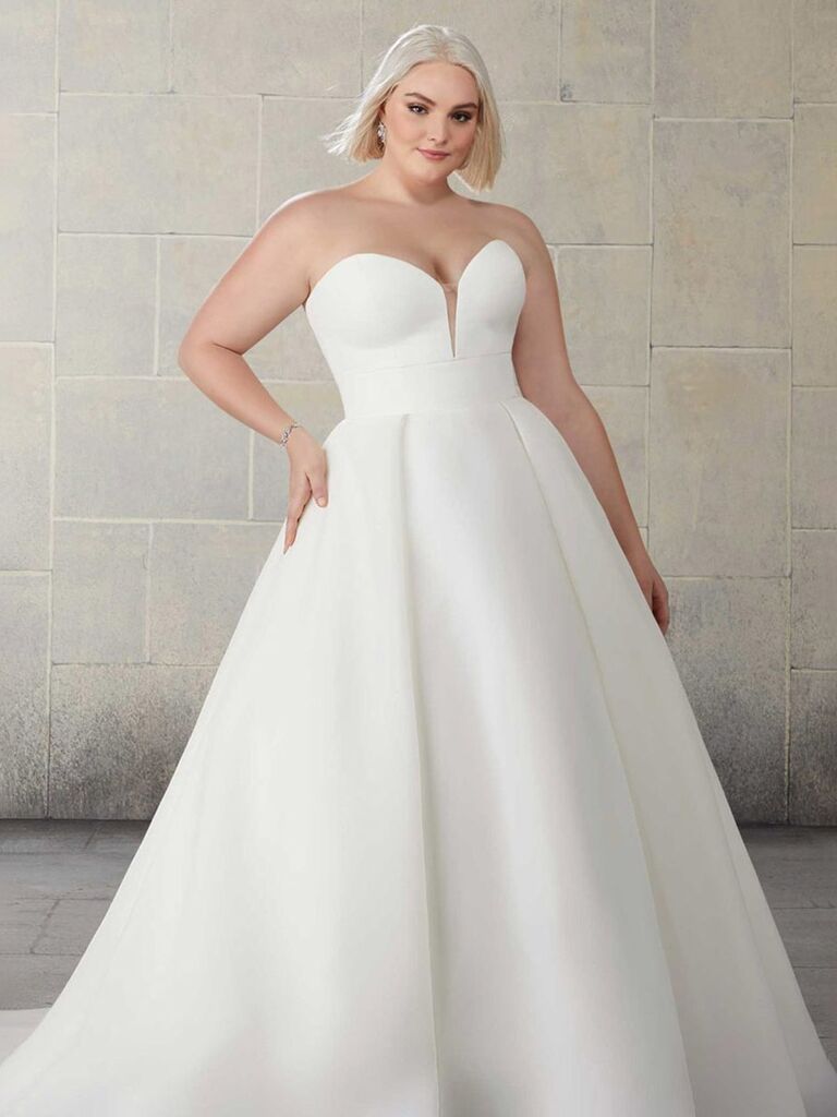 morilee plain ivory strapless wedding dress with sweetheart neckline pockets and pleated ball gown skirt