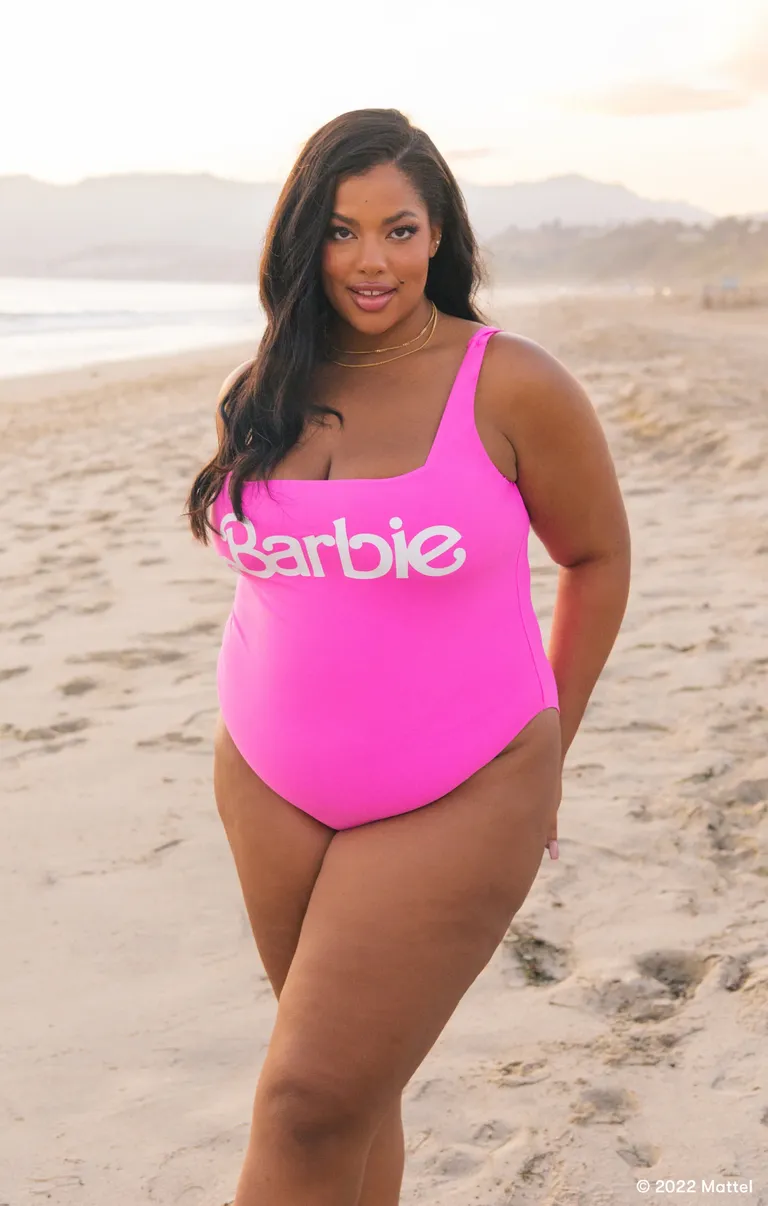 pink one piece with 'barbie'