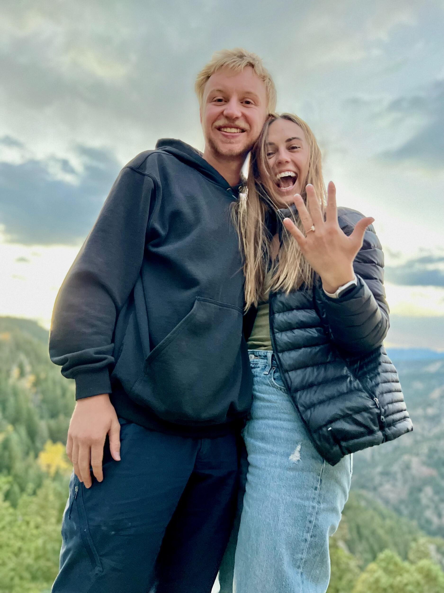 Ben proposes to Britt at a mountainside picnic in their favorite spot.