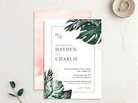Tropical destination wedding invitation with monstera plant leaves
