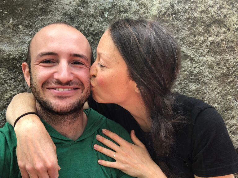 We get engaged while bouldering in Fontainebleau, France.