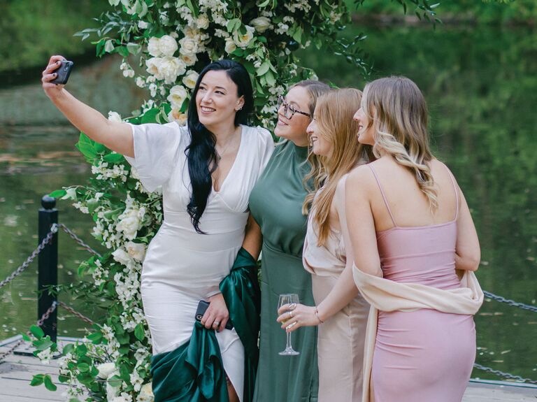 Group of women taking a selfie at wedding venue
