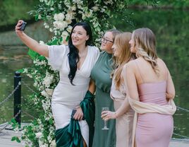 Group of women taking a selfie at wedding venue