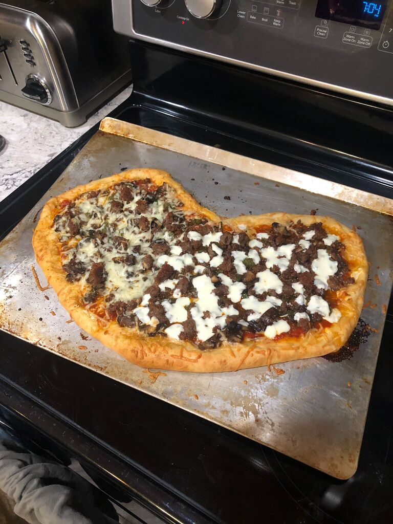 We do Valentine's day pizza right - stuffed crust and all!