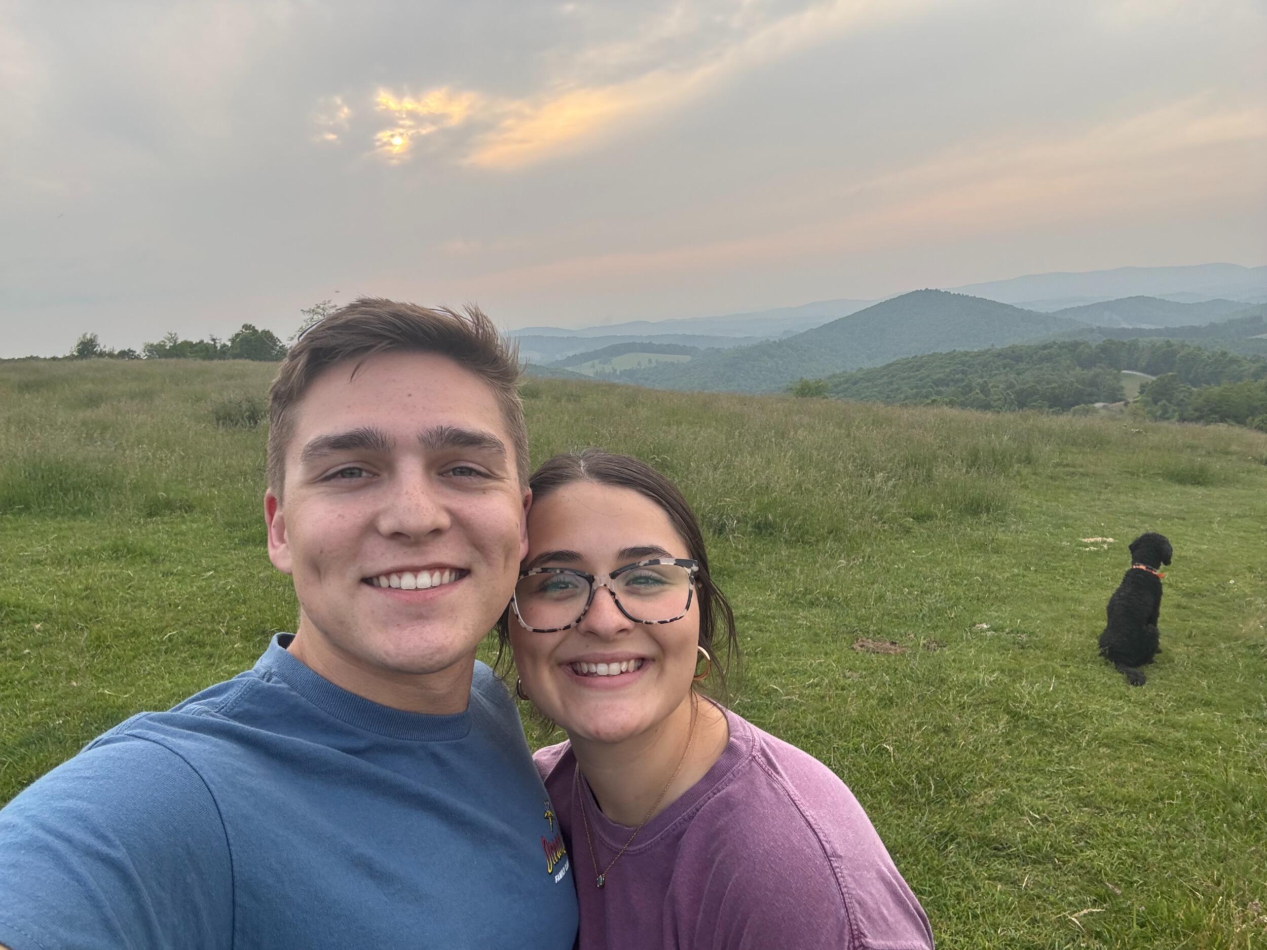 As you all know, all good things must come to an end — at least for a little while.
Caleb’s time off from work came to a close, and on Friday, the 6th, he flew back to California.
This is the last picture Mattie and Caleb took together — after a beautiful hike in the Blue Ridge Mountains.
Now, they will be apart until the end of September, just days before their “Big Day." But with God at the center of their relationship, they know they can weather this season of waiting — and grow even stronger through it.

They are beyond excited for the adventure ahead and can’t wait to celebrate with each and every one of you!