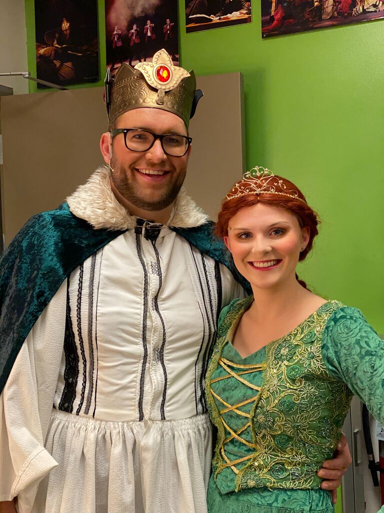 Marni and Alex met while working on UW Fox's production of Shrek the Musical. Alex was cast as many characters, most notably Papa Bear and Marni was cast as Teen Fiona. 