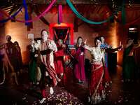 couple dancing during Indian prewedding sangeet party