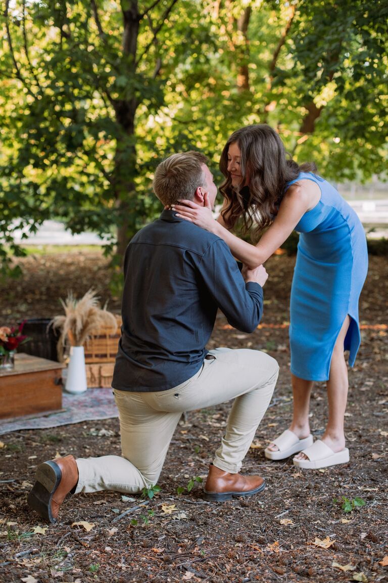 Finally, 10 months and 4 days after meeting my favorite person, I asked her to marry me. Kate had made it very clear that there was no chance I could surprise her with my proposal - challenge accepted. When Kate arrived at Loose Park for a fake picnic organized by her community group, I popped out from behind some bushes to surprise her. I walked her over to a spot I had set up by the water and popped the question. She said yes!