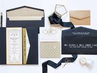 Art Deco gilded design and fonts with gold, black and white color palette