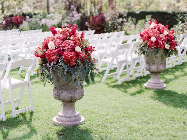 Eucalyptus and red hydrangea aisle decor