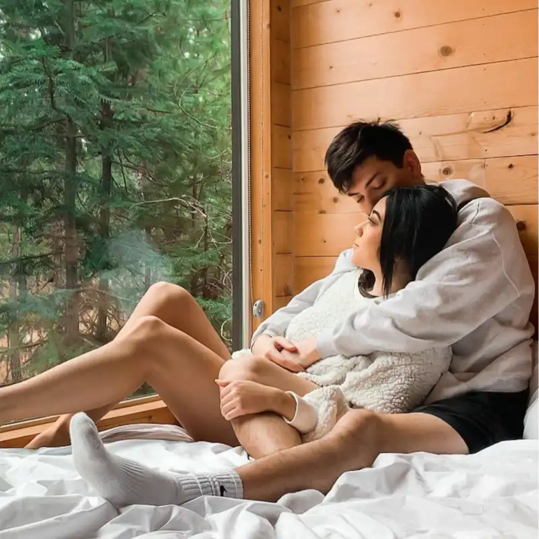 Couple relaxing in a cabin in the woods