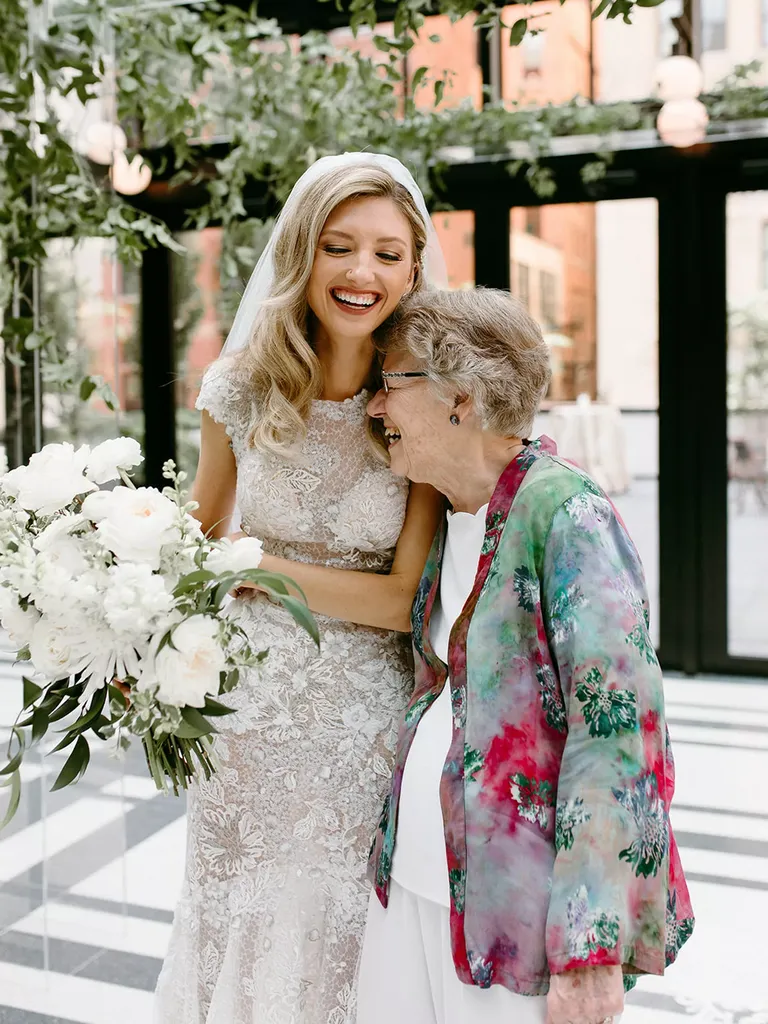 Bride Laughing With Grandmother During Michigan Wedding