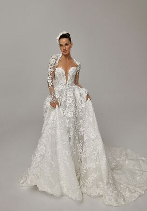 Lizett gown is a romantic A-line silhouette crafted entirely from delicate lace, offering both timeless elegance and a soft, feminine look. It comes with a removable short bolero featuring long sleeves made of fine mesh, creating the illusion of lace directly on the skin — a detail that adds sophistication and subtle drama. The corset showcases a flattering V-shaped neckline and fastens with a zipper at the back. A long, graceful train and multiple underlayers in the skirt give the gown beautiful volume and movement. When the bolero is removed, the dress transforms into a more open and airy look, making Lizett perfect for brides who want versatility and refined charm in one design.