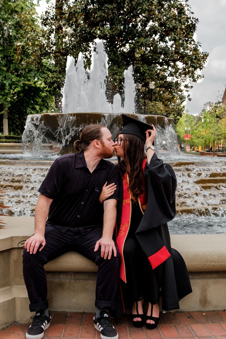 Alexis graduates with her Master's in Social Work with the love and support from the best boyfriend 