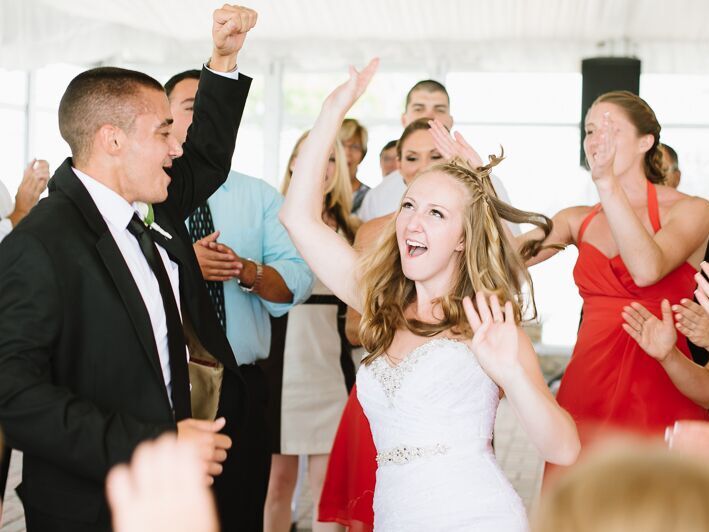 Couple dancing with their guests at the reception
