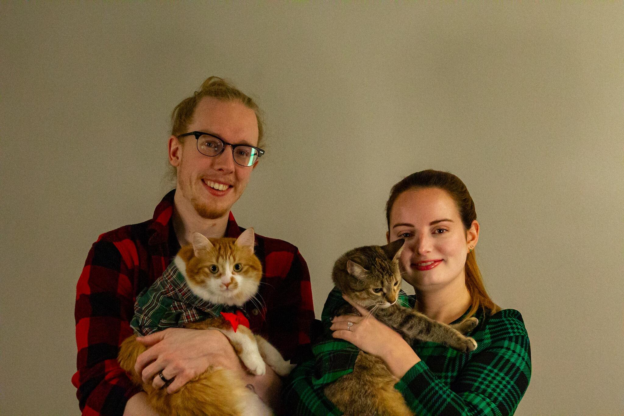 Our first Christmas with the two kitties; everyone is all dressed up and matching for the family photo.