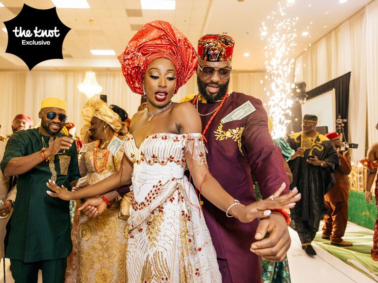 Chiney Ogwumike and husband Raphael Akpejiori dancing at Nigerian wedding ceremony