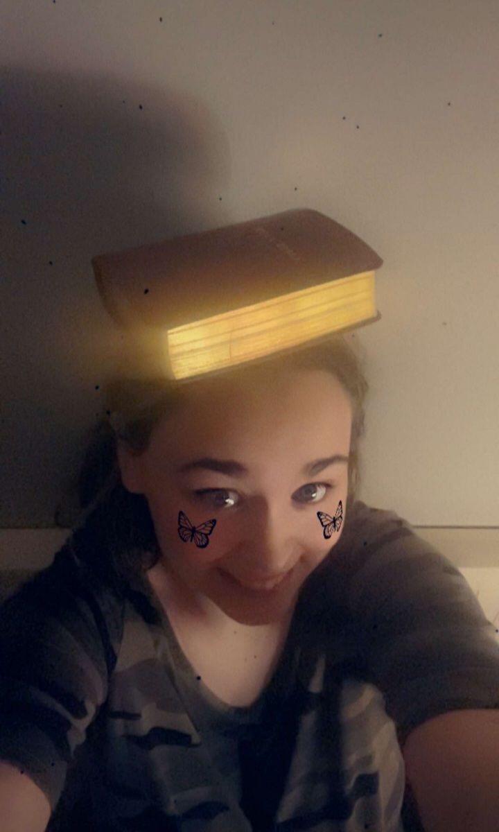 The moment he fell in love. He asked her for a picture showing some way to prove she was real. He asked for a picture of her with a Bible on her head so this is what she sent him!