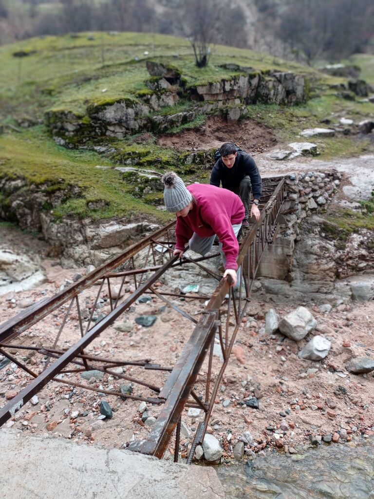 All of the bridges had been washed out, but there were metal frames across where the bridges used to be. Climbing over was a fun adventure.