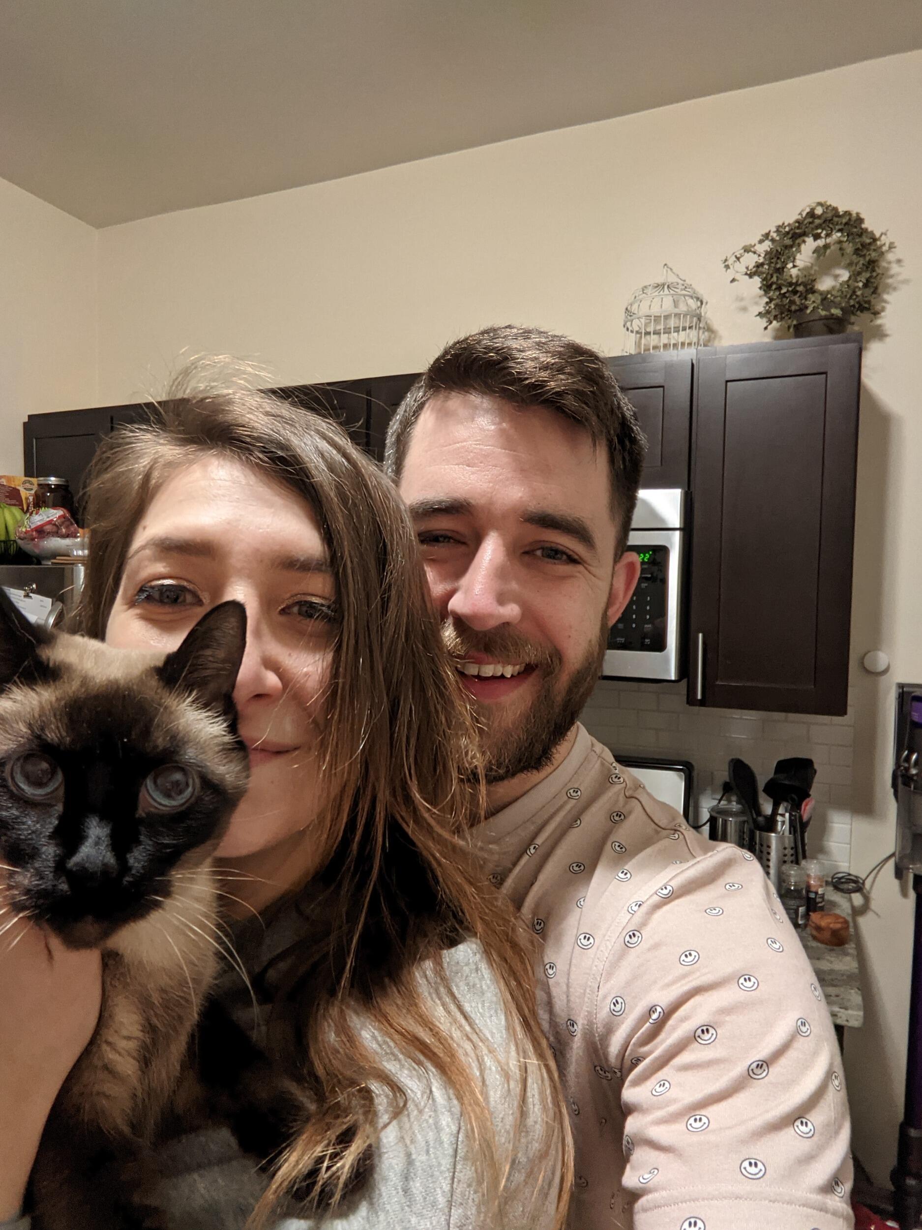 COVID added a pretty large gap of not many flattering photos of the two of us :) But this photo timeline wouldn't be complete without at least one photo of us with our precious angel Princess Frankenstein. The 3 of us a few months after moving into our first apartment together :)
