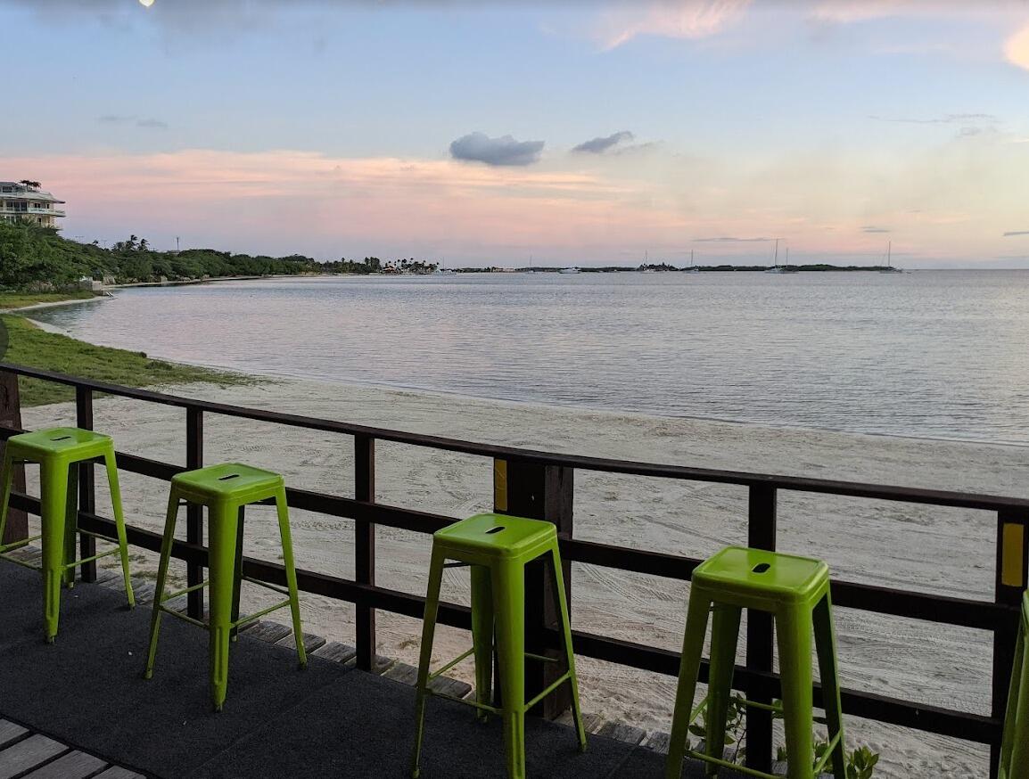HAPPY HOUR! 
     Time: 6:00 pm-8:00 pm
      Location: The West Deck 
     Address: Lloyd G. Smith Blvd, Oranjestad, Aruba
      Attire: wear what you're comfortable in,  casual dinner attire. Think light sundress, shorts, flip-flops.
Join the bride and groom to watch the sunset the night before their big day.  We will have small bites and drinks at The West Deck. Transportation is NOT provided to and from West Deck.