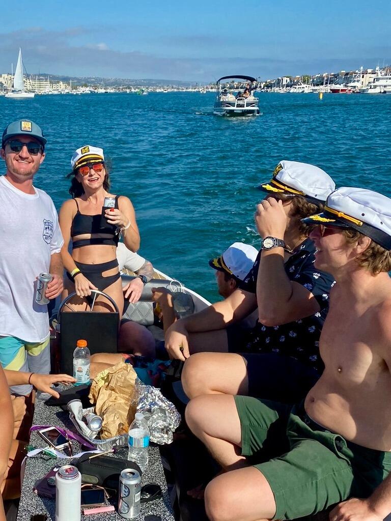 We both met each other through mutual friends on a boat in Newport Beach, California. 