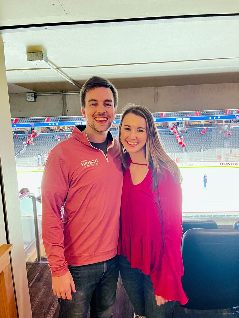 Our first picture together - 2 weeks after our first date, Zach invited Ansley to a Washington Capitals hockey game to meet his roommates at the time (and now groomsmen), Garrett and Johnny.