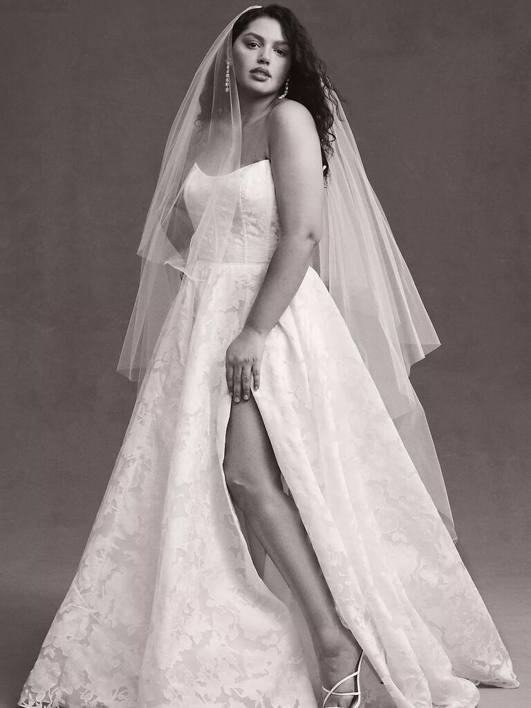 Strapless plus sized wedding dress by Jenny Yoo. 