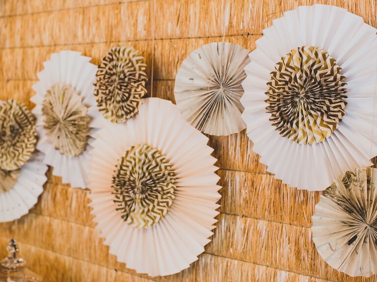 White and gold paper rosettes