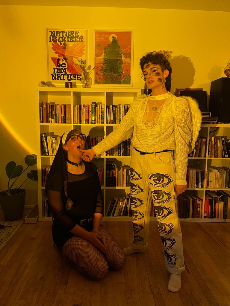 Couple's costume: biblically accurate angel and a nun.