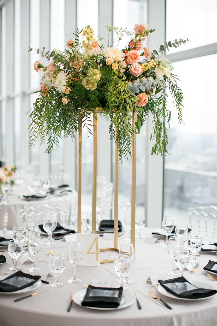 Round Tables with Elegant Tall Centerpieces