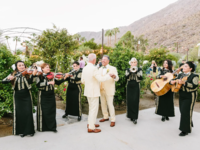 Grooms dancing while Mariachi band plays