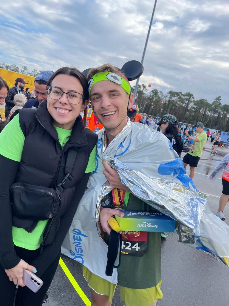 Kara and Drew at the finish line of Drew's first full marathon, the Walt Disney World Marathon. 