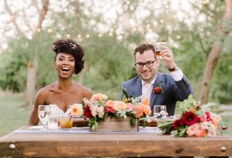 Bride and groom toasting with champagne 