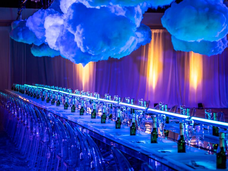 Dark blue wedding reception space with floating clouds