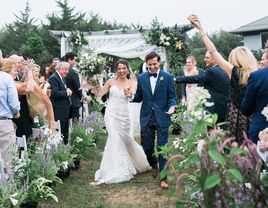 Bride and groom exiting ceremony