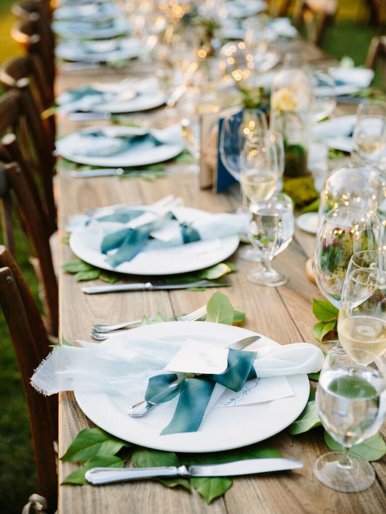 Elegant table settings with leaves for your outdoor vineyard wedding reception