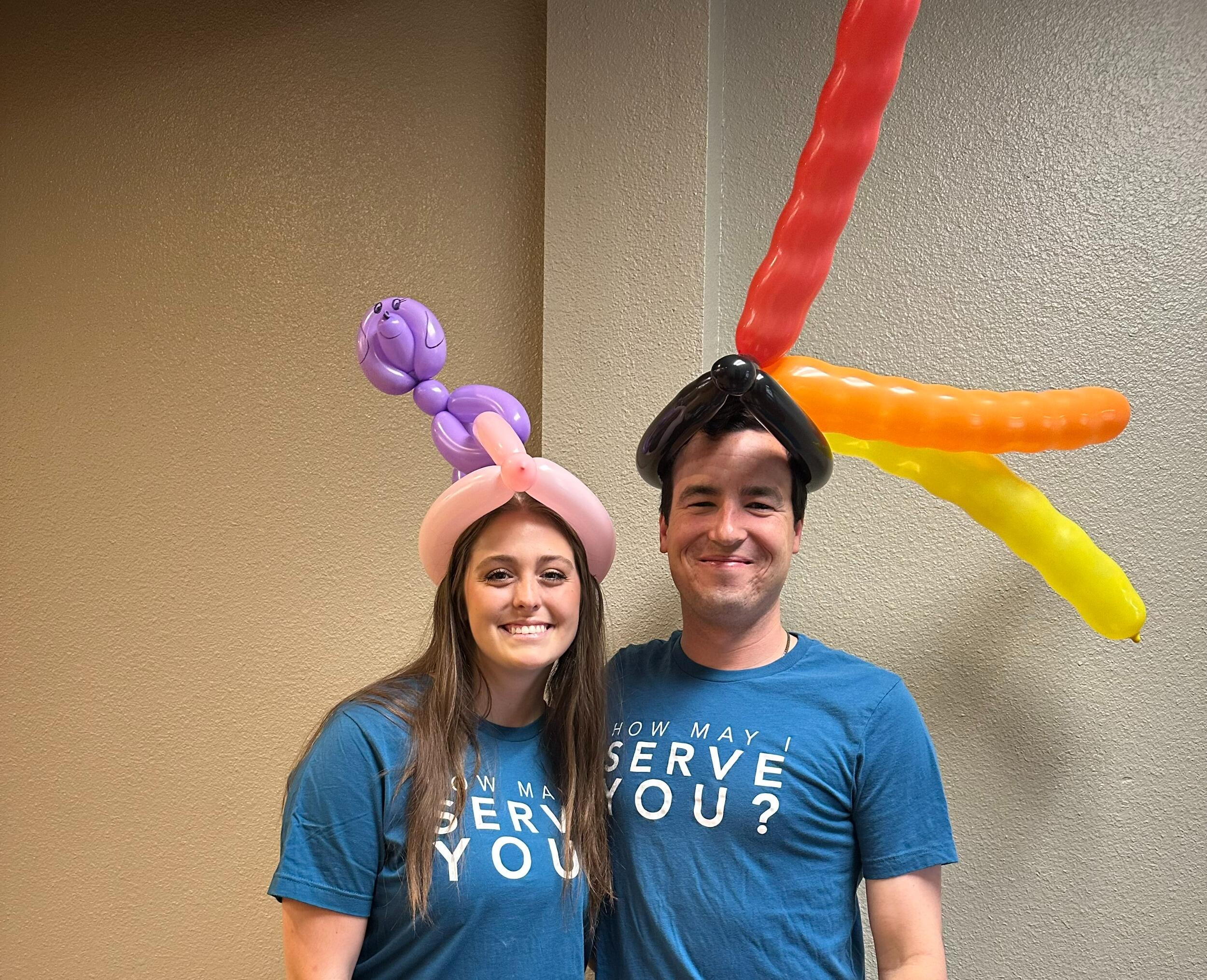 Wearing balloon hats while volunteering at Spingapaloza 