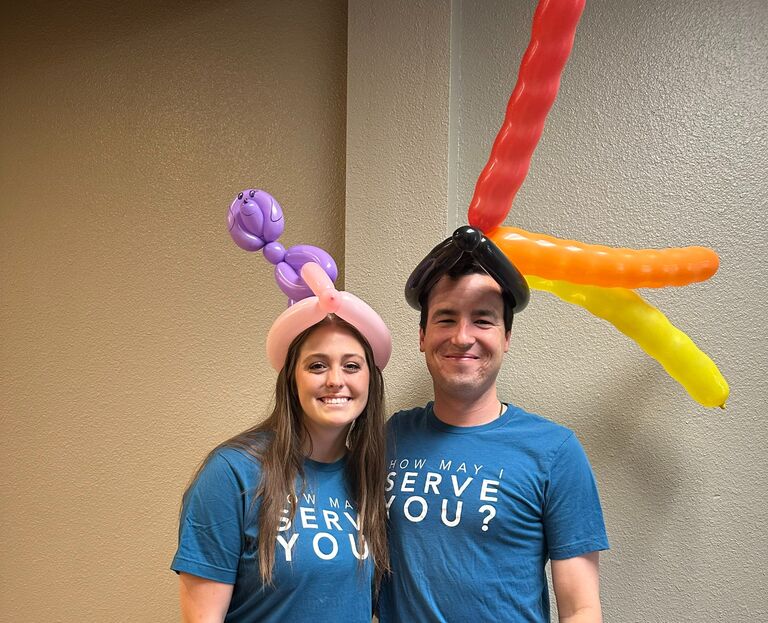 Wearing balloon hats while volunteering at Spingapaloza 