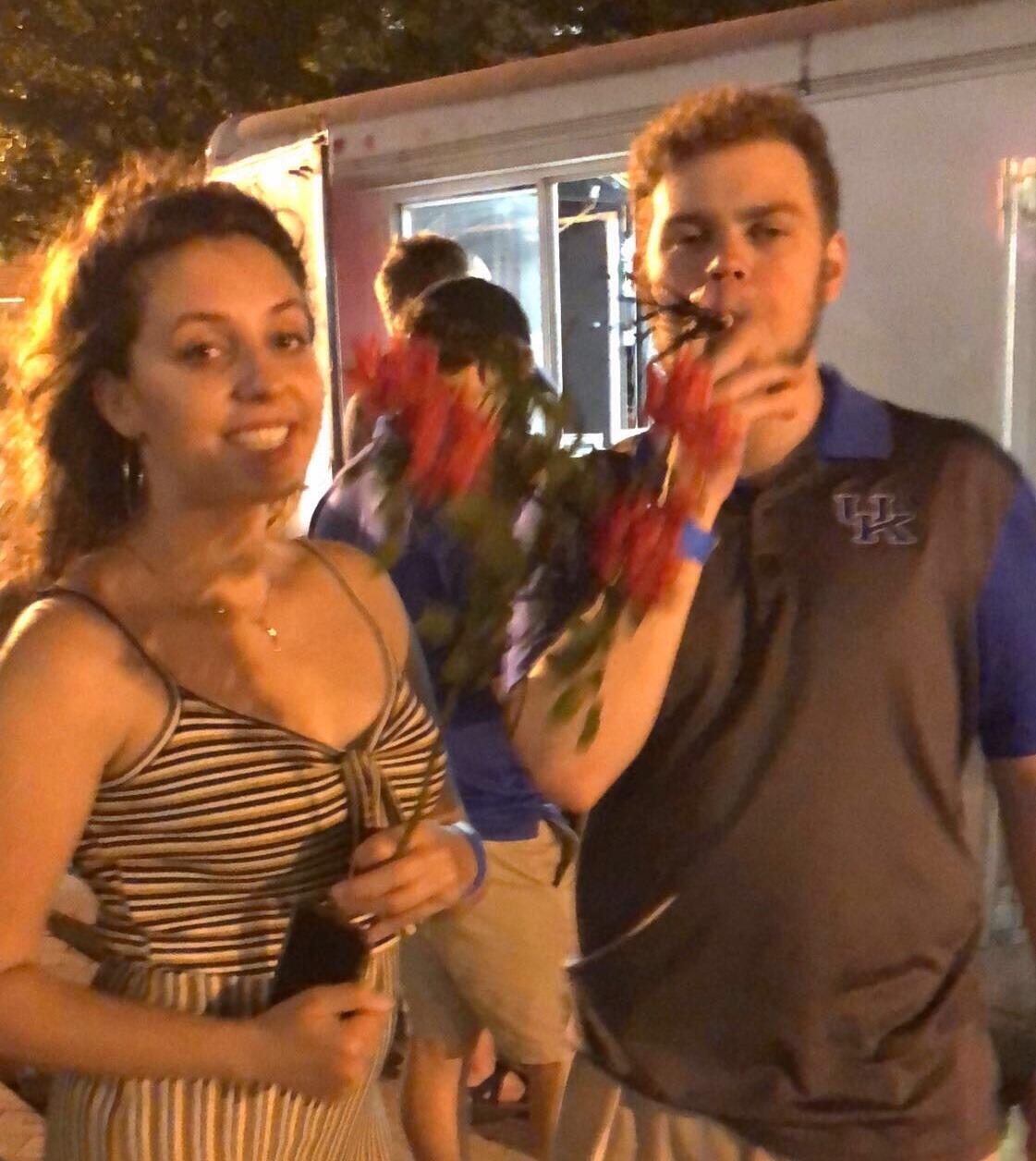 Sam's 21st birthday: Griffin picked her flowers from a rose bush and found out the hard way that roses have thorns.