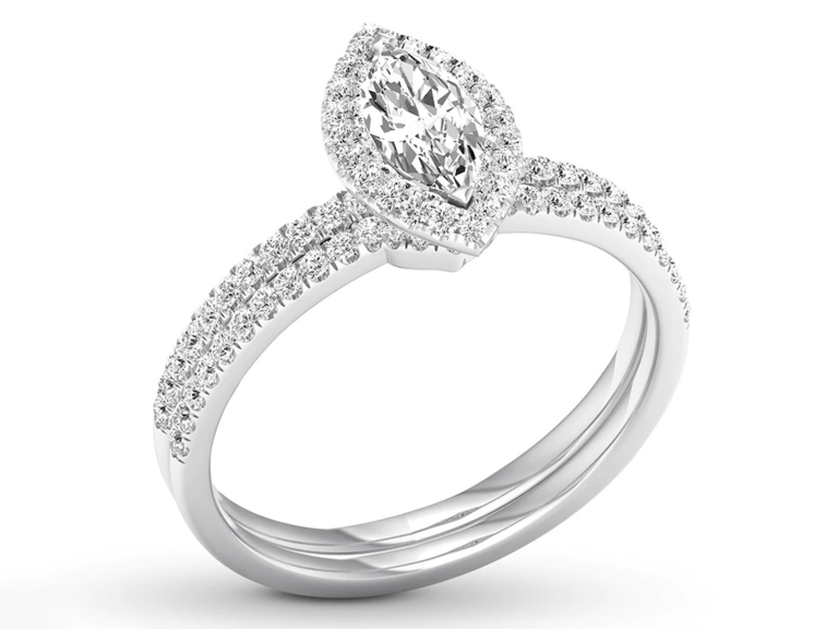Marquise diamond center with halo and double diamond pave bands in white gold