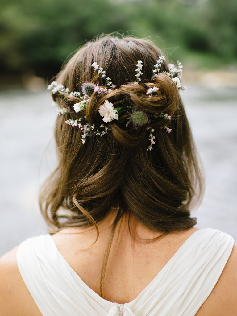 country wedding hairstyles half up with wildflowers