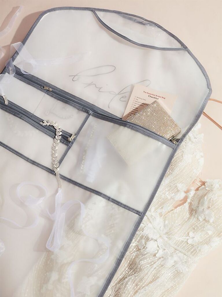 White bag with gray outline and 'bride' in champagne script