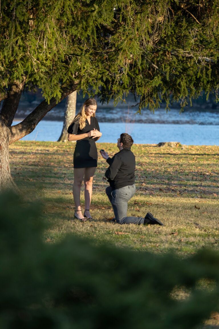 Eli proposed! In the place we had taken many walks and dreamed about living one day, Eli asked Macy to marry him under a gigantic Evergreen tree (something that holds a special meaning for them). One of Macy's best friends, Emma, was hiding in the bushes to capture it all!