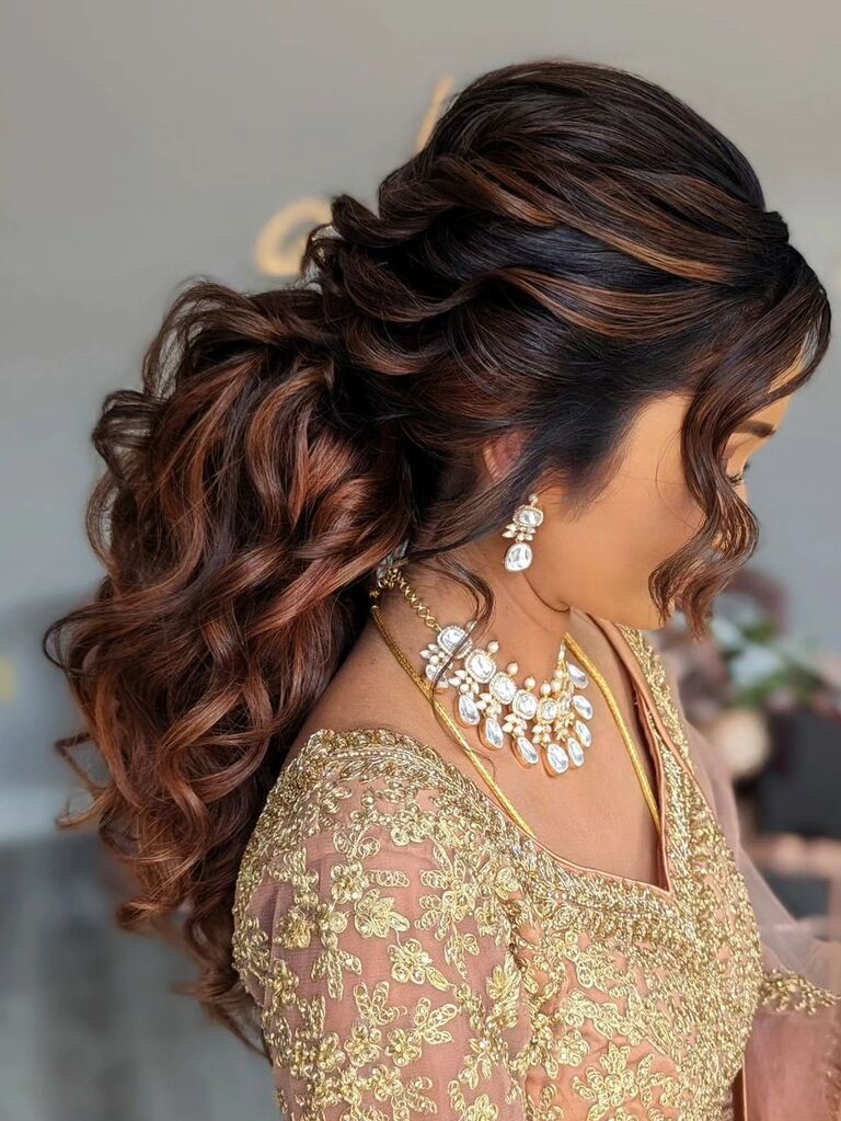 Big curly ponytail wedding updo for long hair