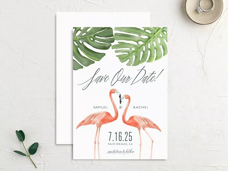Palm leaves and flamingo graphics with 'Save the Date' in cursive type on white background